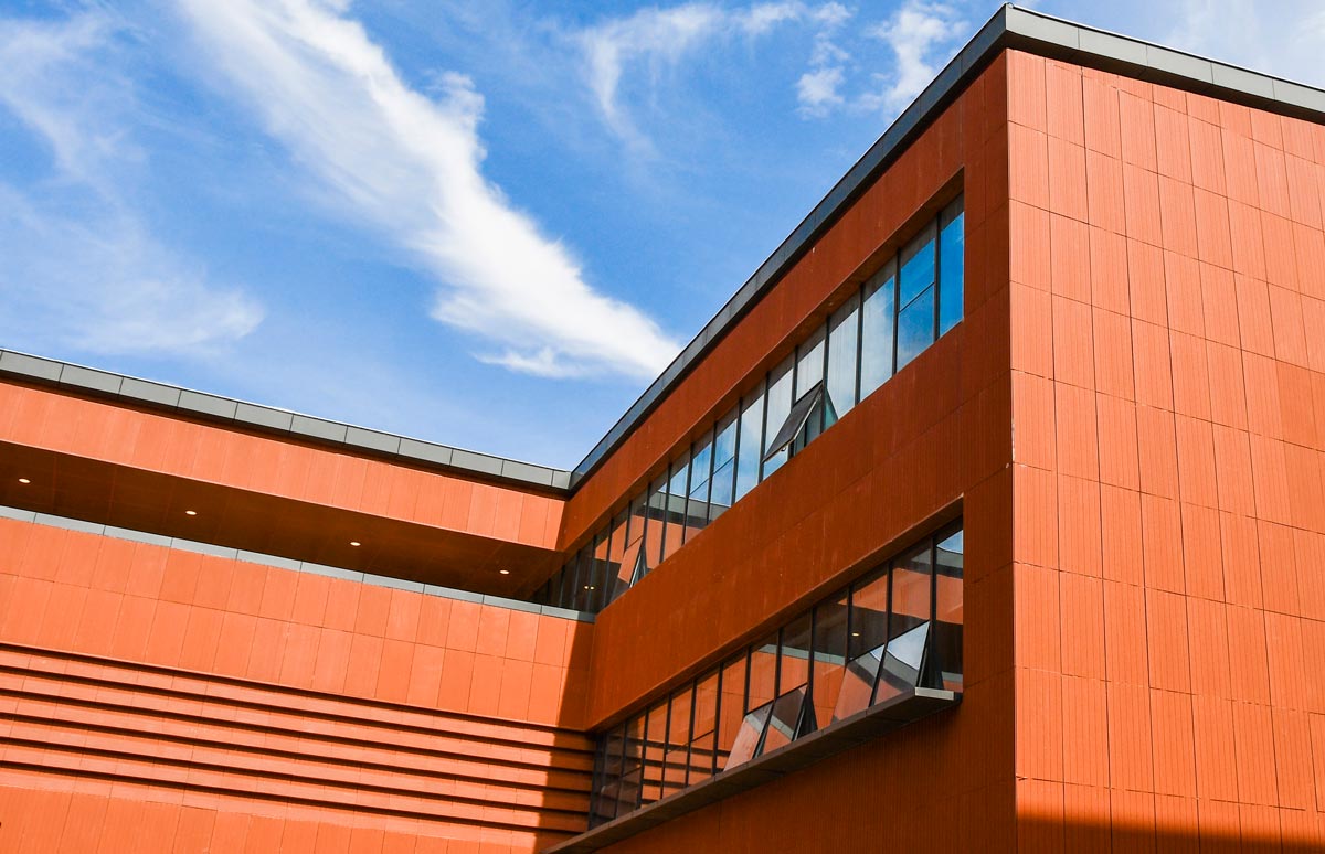 Terracotta wall panels combine with terracotta tube.jpg