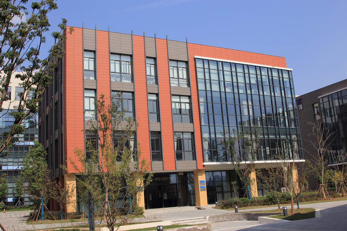 Terracotta wall cladding for industrial park in red and grey.jpg