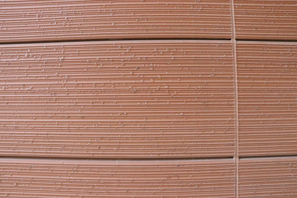 Terracotta Panel In Transparent Droplet Glazes.jpg
