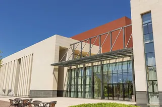 Bright Red Terracotta Wall Light Up the Exhibition Hall