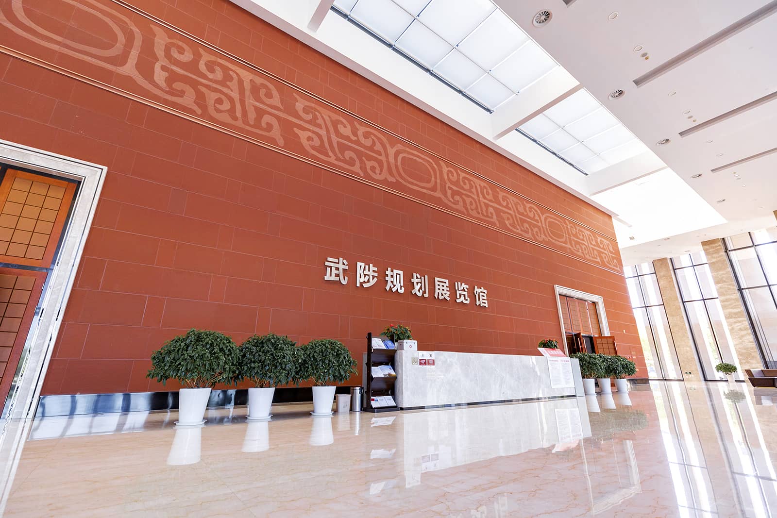 Lobby Facade clad in micro-carved terracotta.jpg