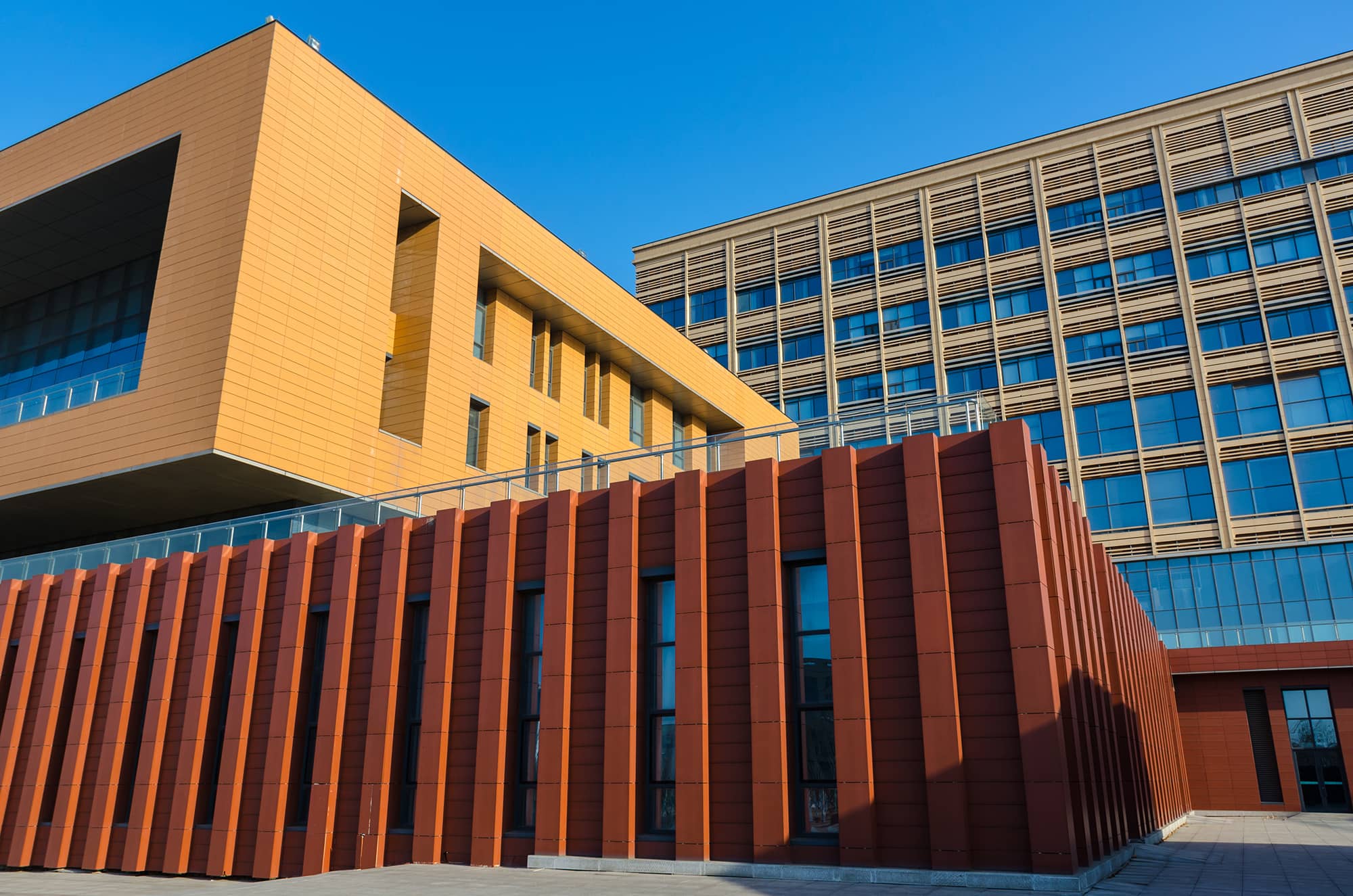 Library facade in beige orange and red terracotta.jpg