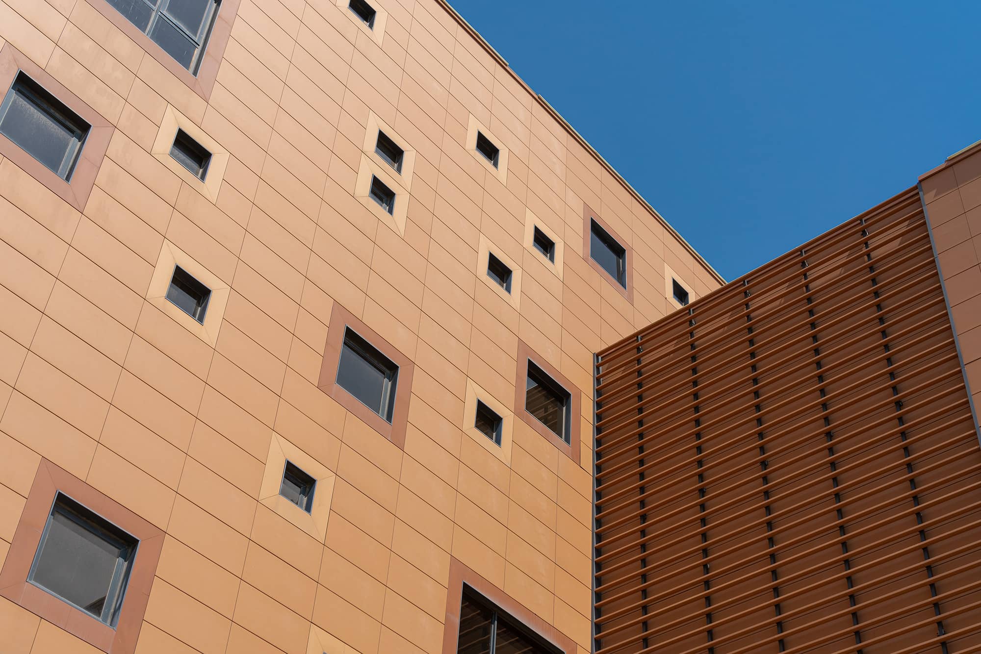 Terracotta panels incorporated with terracotta baguettes.jpg