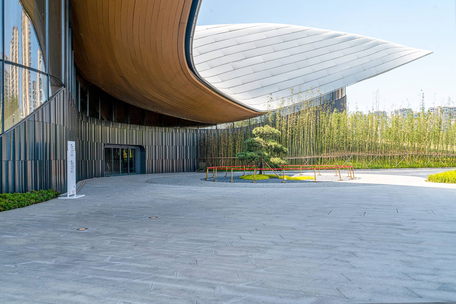 The wall of Tianfu Art Museum clad in LOPO curved, textured terracotta panels.jpg