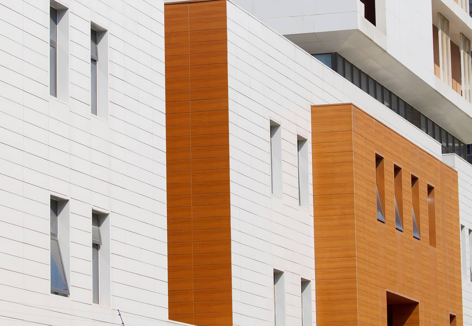 Hospital Facades in 3D inkjet red wood-grained terracotta panels.jpg