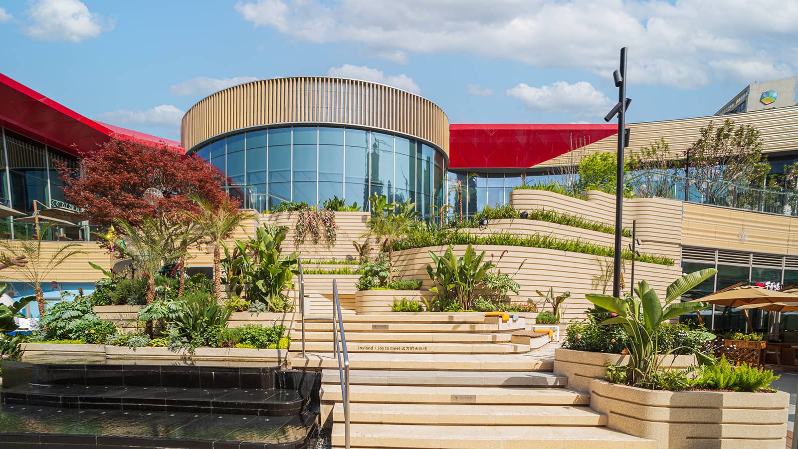The multi-story staggered open-air terraces.jpg