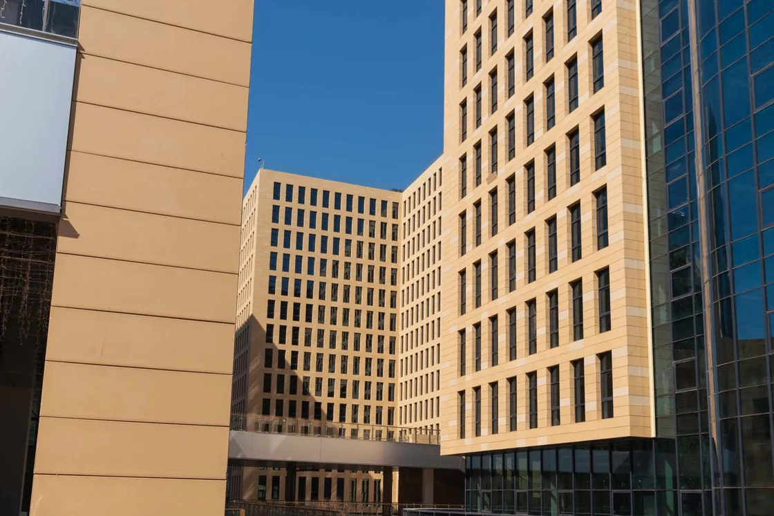 aiKai Park Beijing - Southeast elevation featuring LOPO large-format terracotta panels in warm earth tones..jpg