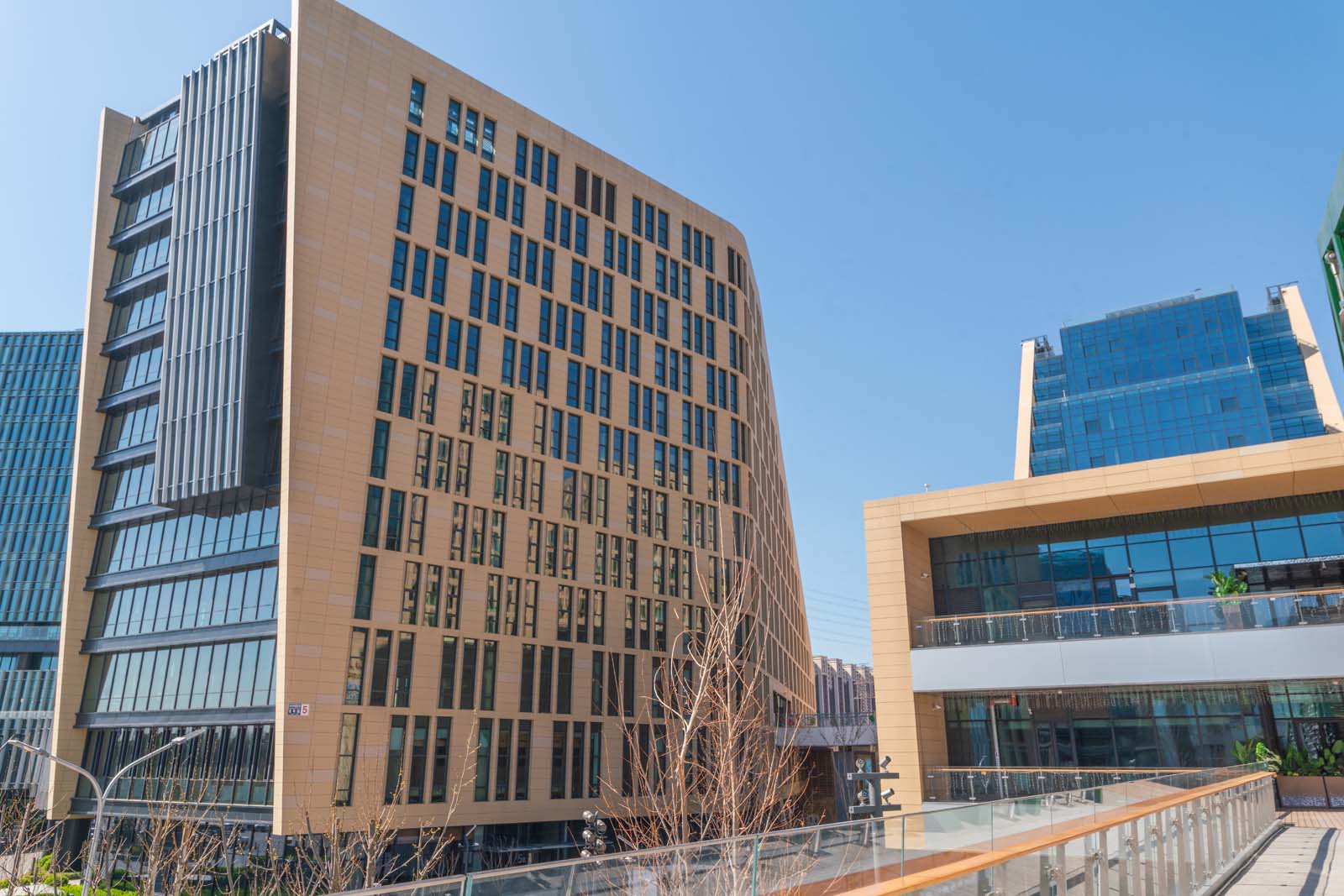 Installation of LOPO large-format terracotta panels on Building #5 at HaiKai Park..jpg